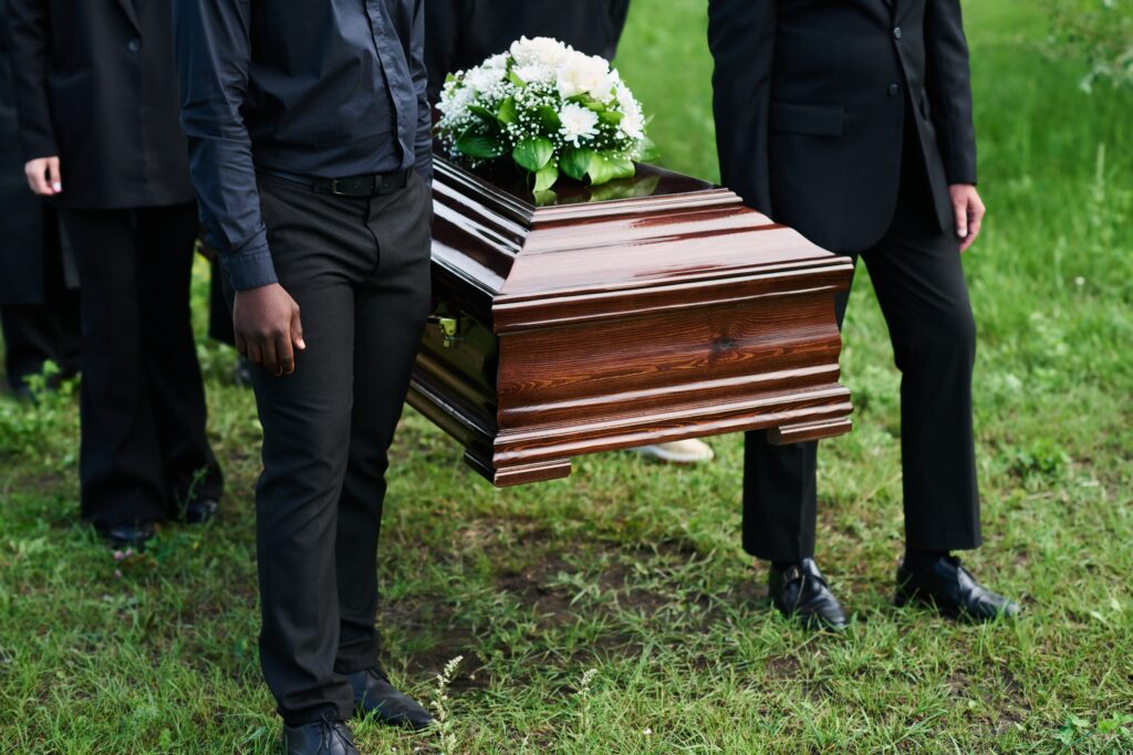 men carrying a casket